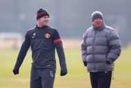 MANCHESTER, ENGLAND - MARCH 04:  Wayne Rooney of Manchester United and Sir Alex Ferguson look on during a training session at Carrington Training Ground on March 4, 2013 in Manchester, England.  (Photo by Alex Livesey/Getty Images)